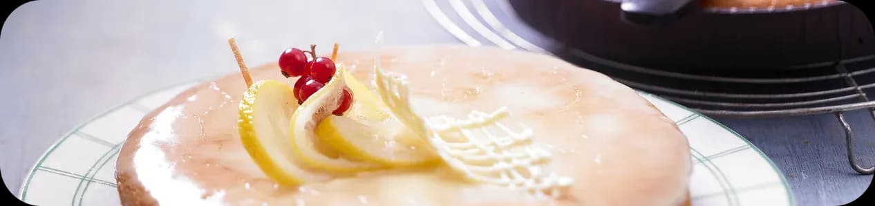 Glazed lemon tart decorated with lemon slices