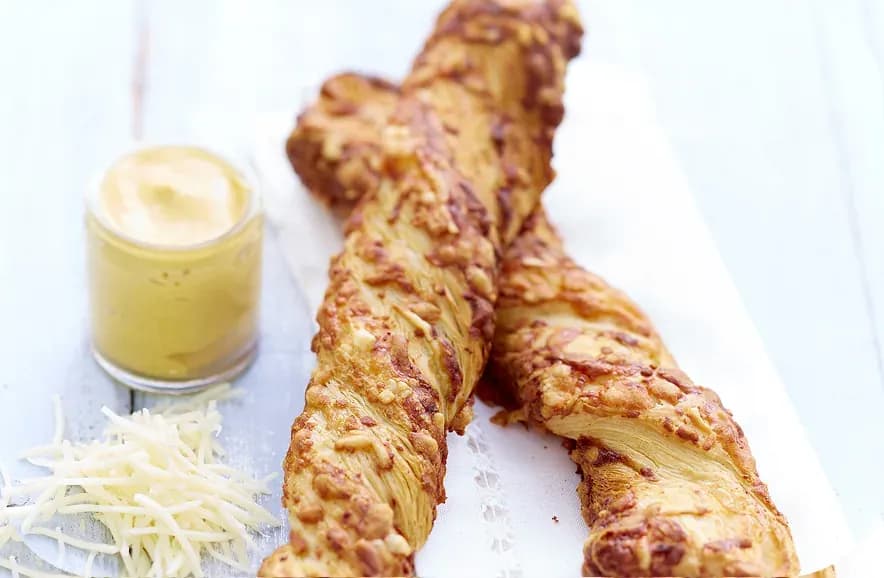 Cheese twists with a mustard dip
